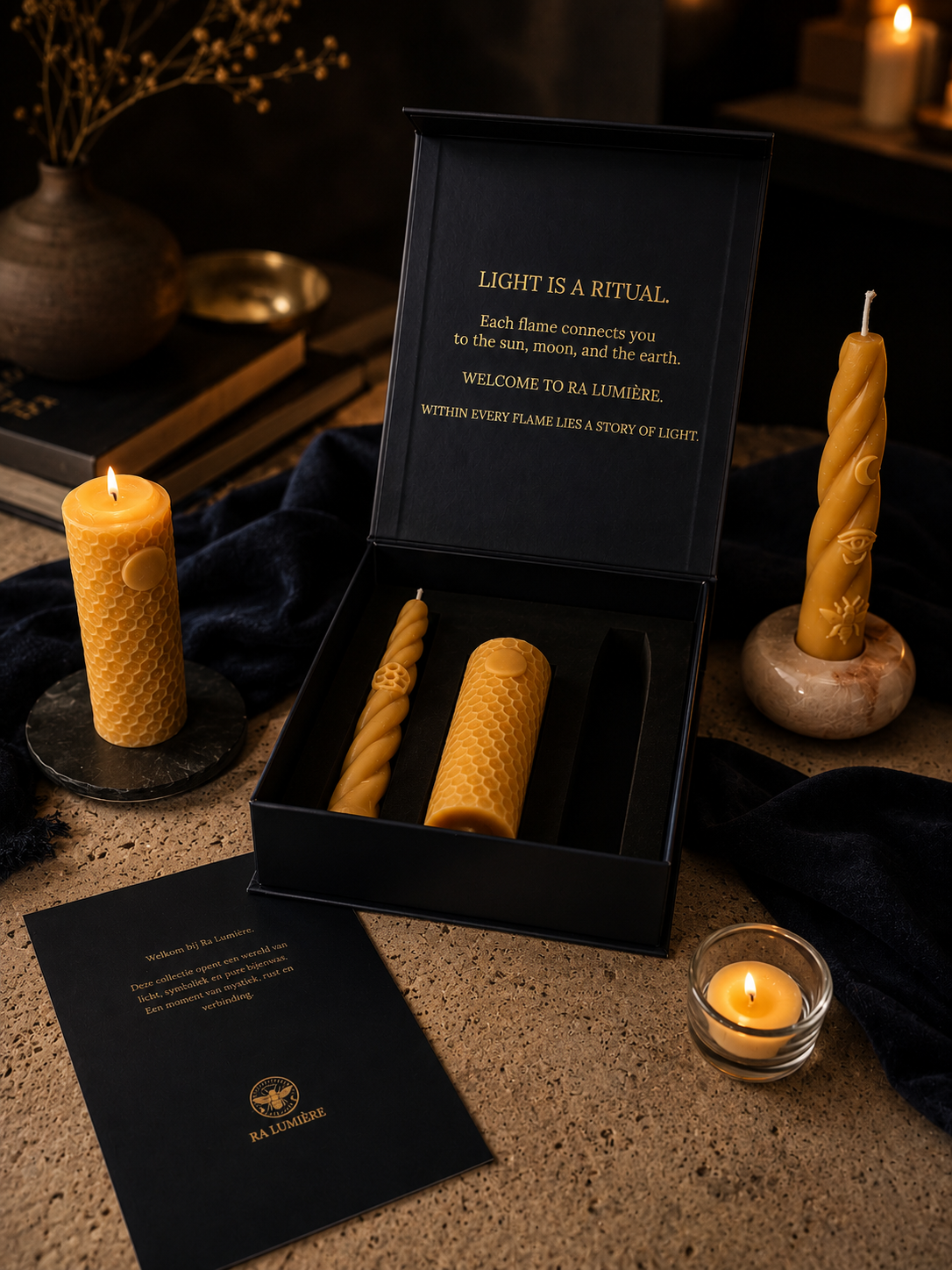 Ra Lumière beeswax candle collection with Earth, Moon and Sun ritual candles, natural stone holders and luxury gift box.