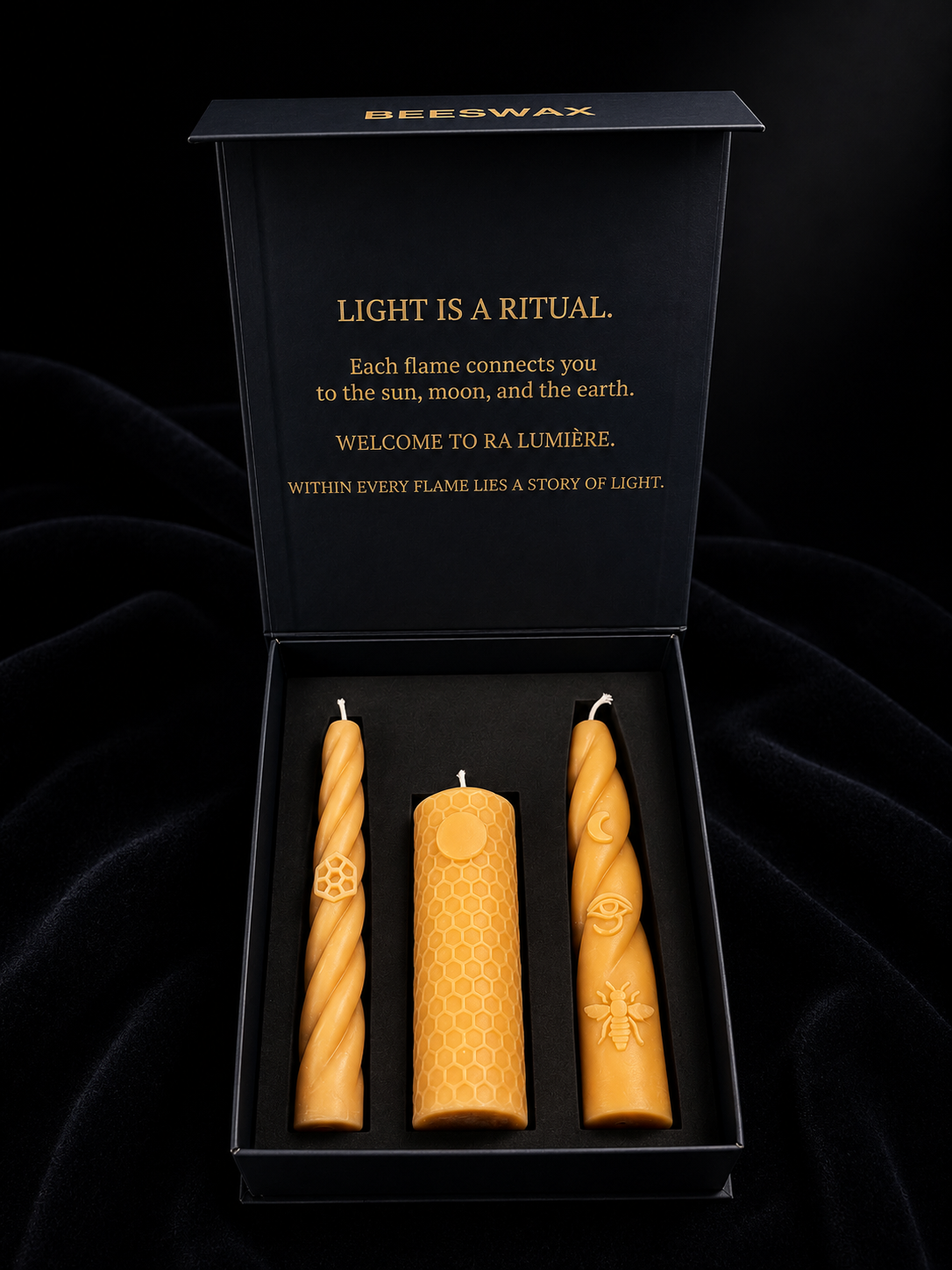 Ra Lumière Earth, Sun and Moon handcrafted beeswax candles presented in a luxury ritual gift box.