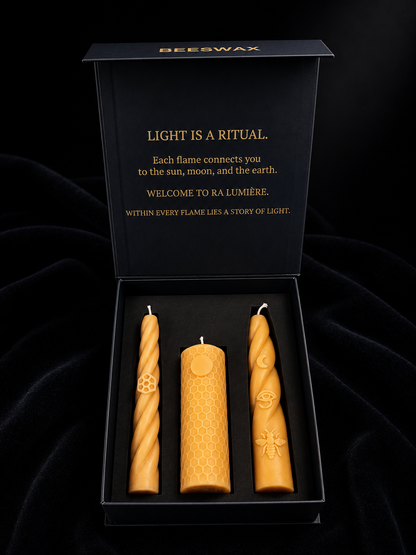 Ra Lumière Earth, Sun and Moon handcrafted beeswax candles presented in a luxury ritual gift box.