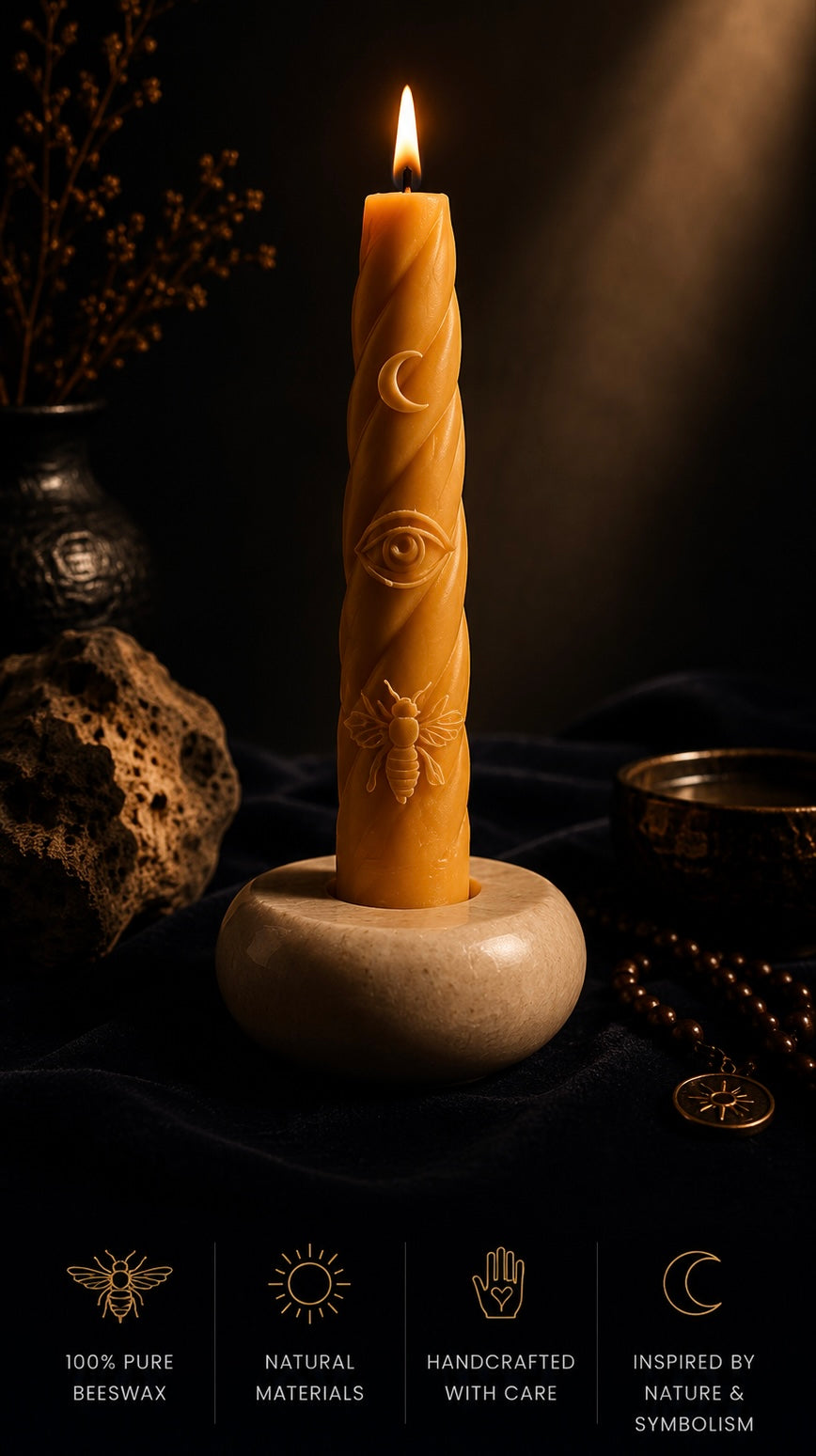 Handcrafted beeswax Moon candle in a natural alabaster holder, styled in a warm ritual setting with natural stone, linen and candlelight. Made from 100% pure beeswax and inspired by nature, symbolism and slow living.