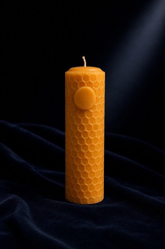 Ra Lumière Sun Candle Ra, handcrafted from 100% pure beeswax with honeycomb texture and sun symbolism.